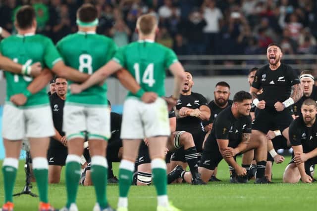 Ireland players face the New Zealand haka led by TJ Perenara before the World Cup quarter-final. Picture: Stu Forster/Getty