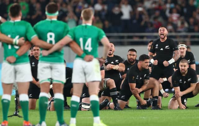 Ireland players face the New Zealand haka led by TJ Perenara before the World Cup quarter-final. Picture: Stu Forster/Getty