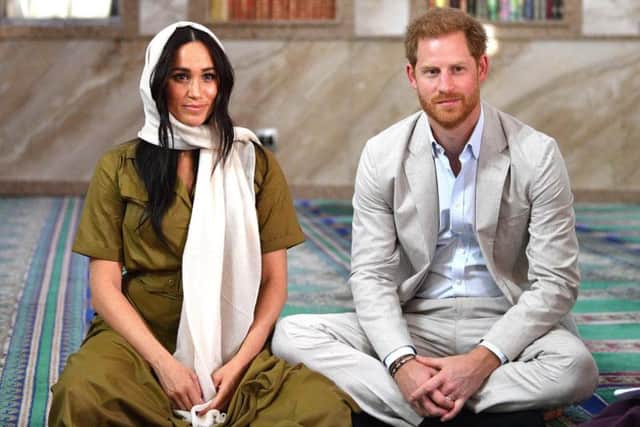 Meghan, Duchess of Sussex, and Harry during their tour of South Africa