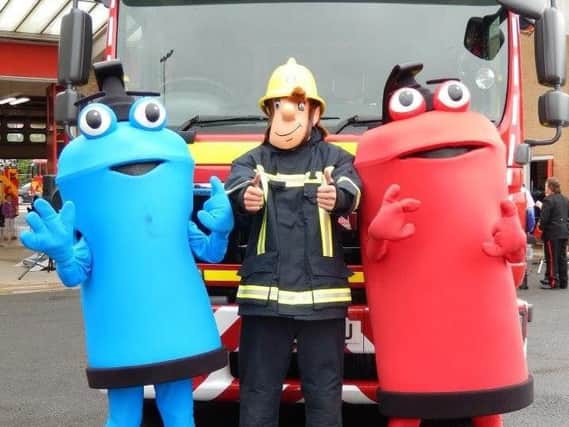 A Lincolnshire County Council photo of their three mascots, including Fireman Sam (centre)