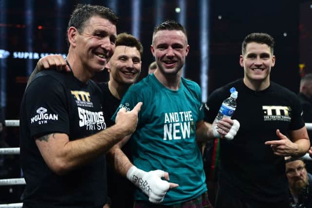 Terry McCormack, left, with Josh Taylor after his victory over Ivan Baranchyk in May. Picture: Mark Runnacles/Getty Images