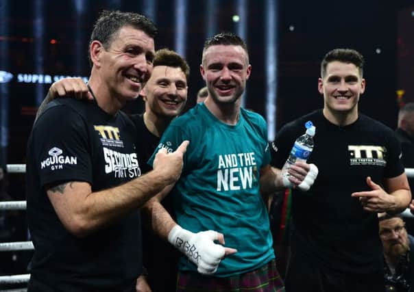 Terry McCormack, left, with Josh Taylor after his victory over Ivan Baranchyk in May. Picture: Mark Runnacles/Getty Images