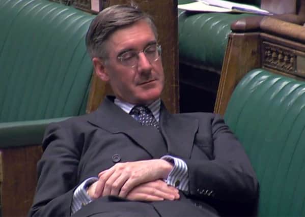 Privately educated Commons leader Jacob Rees-Mogg relaxes during an emergency debate on a no-deal Brexit (Picture: PRU/AFP/Getty Images