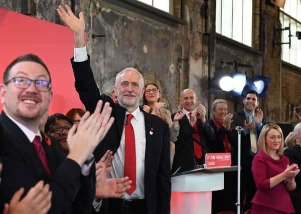 Jeremy Corbyn launches the Labour Party's general election campaign to cheers from supporters (Picture: Daniel Leal-Olivas/AFP via Getty Images)