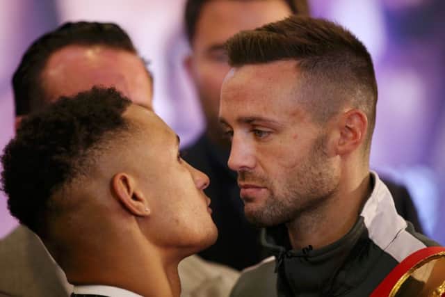 Regis Prograis, left, and Josh Taylor apply the obligatory intimidating stare as they met at yesterdays press conference. Picture: Getty.