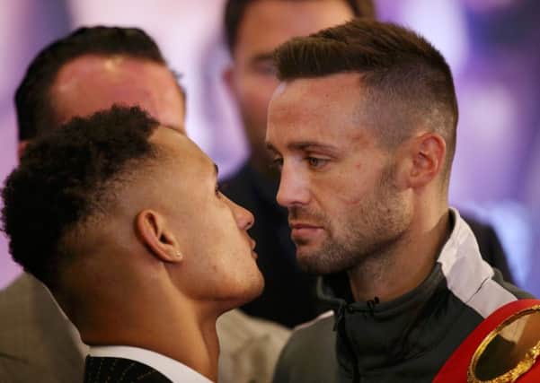 Regis Prograis, left, and Josh Taylor apply the obligatory intimidating stare as they met at yesterdays press conference. Picture: Getty.