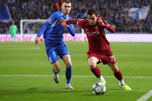 Andy Robertson goes past Bryan Heynen of Genk during Wednesdays Champions League clash. Picture: Getty.