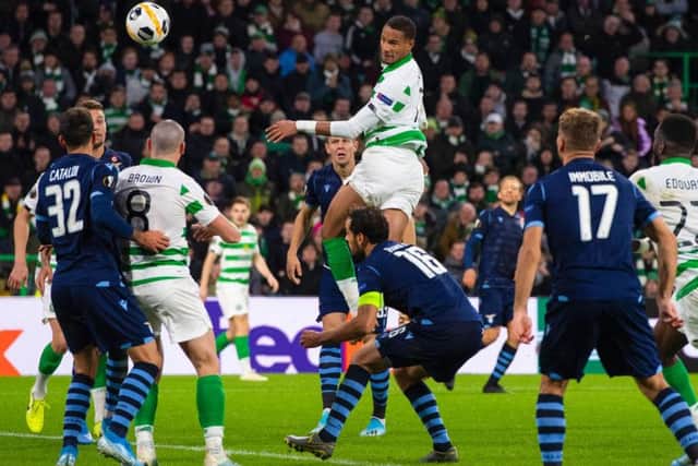Christopher Jullien soars above the defence to head Celtic ahead. Picture: SNS