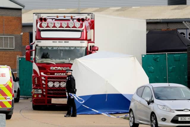 The lorry in which the bodies were found behind police tape at the Waterglade Industrial Park in Grays, Essex. Picture: Aaron Chown/PA