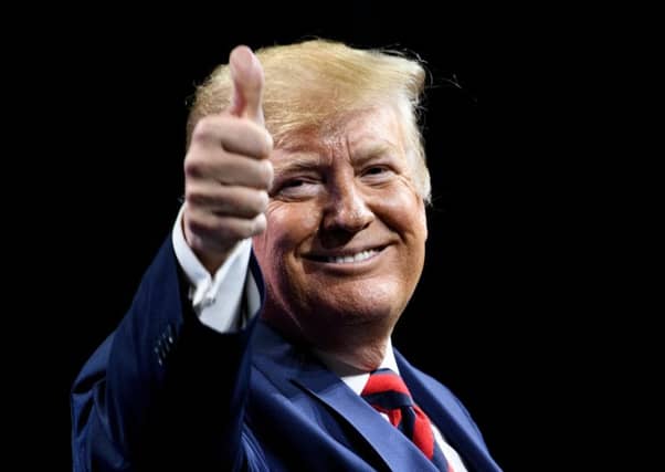 Donald Trump threatened to 'drop' IS fighters on the UK border. Picture: Brendan Smialowski / AFP
