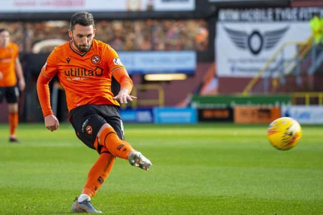 Nicky Clark makes it 2-0 against Dunfermline as Dundee United returned to winning ways. Picture: Ross Macdonald/SNS