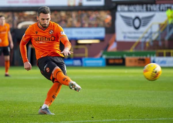 Nicky Clark makes it 2-0 against Dunfermline as Dundee United returned to winning ways. Picture: Ross Macdonald/SNS