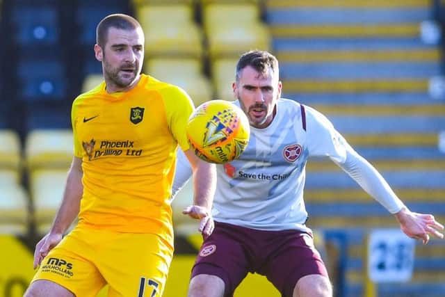 Hearts struggled against a solid Livi side who were still comfortable despite playing 40 minutes with ten men. Picture: SNS