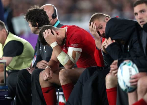 Dejection on the Wales bench during their defeat by South Africa. Picture: PA.