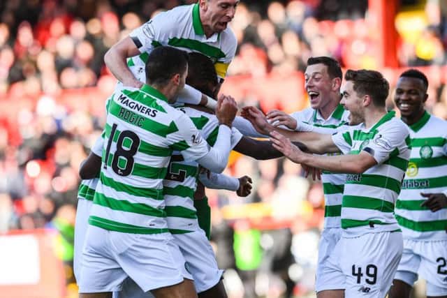 The Celtic squad celebrate with Jeremie Frimpong after he scores his first Celtic goal. Picture: SNS