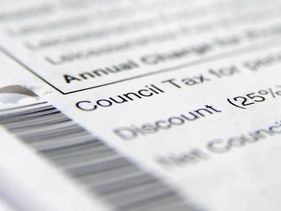 The charity has urged people to check if they are eligible for a reduction in council tax, which should save them an average of 700 every year. Picture: PA