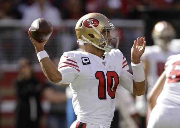 San Francisco 49ers quarterback Jimmy Garoppolo throws a pass during their win over Carolina. Picture: Ben Margot/AP