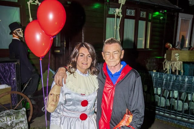 The couple throw themselves fully into their decorations.