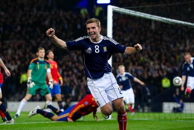 James Morrison celebrates a goal against Spain at Hampden