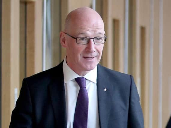 Deputy First Minister John Swinney has revealed he will still press ahead with a "Named Person approach".