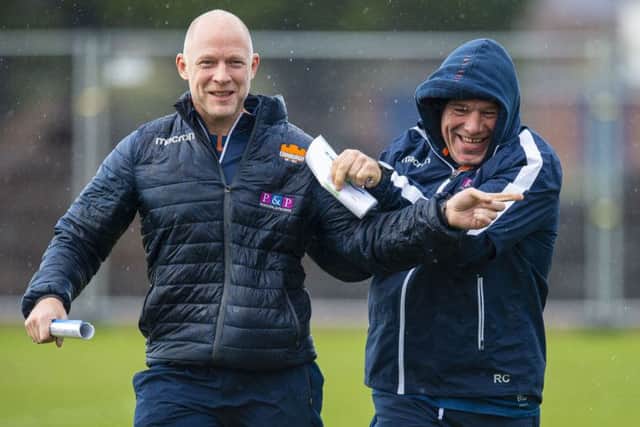 Edinburgh head coach Richard Cockerill, right, jokes around with assistant Duncan Hodge at BT Murrayfield. Picture: Ross MacDonald/SNS