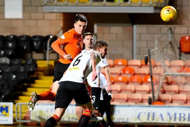 Lawrence Shankland heads home Dundee United's winner in the 62nd minute.