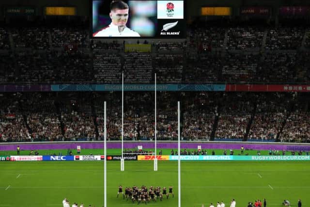 The England players line up as New Zealand perform the Haka prior to their semi-final clash.