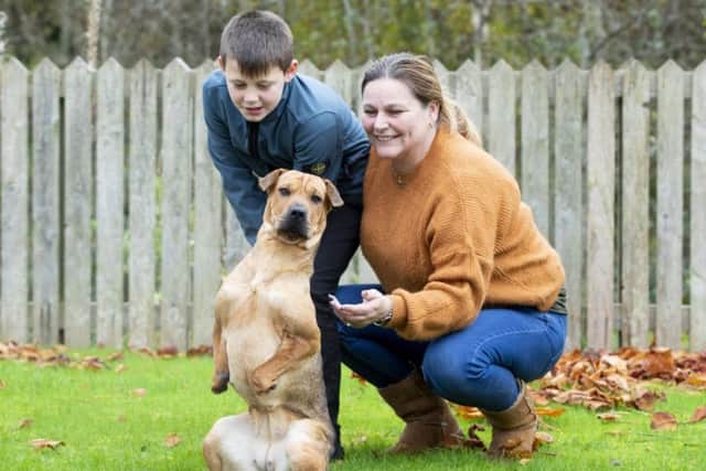 In happier times with foster mum Karen and her grandson Tyler. Picture: SWNS