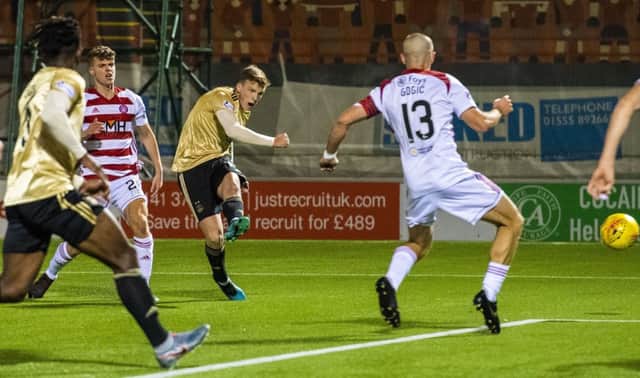Aberdeen midfielder Lewis Ferguson fires home the only goal of the night against his former club. Picture: Sammy Turner/SNS