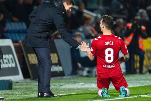 Ryan Jack celebrates his first goal with Steven Gerrard