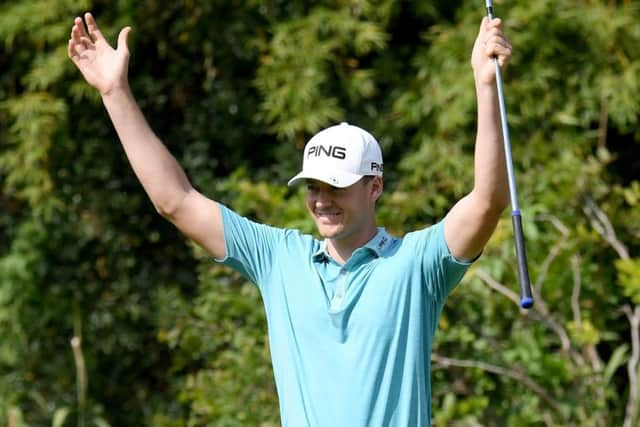 Dundee-based Frenchman Victor Perez reacts to holing a putt in his opening 65 in the WGC-HSBC Champions in Shanghai. Picture: Ross Kinnaird/Getty Images