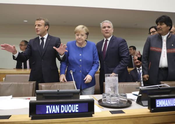 UK may find its standing on the world stage diminished. Emmanuel Macron, Angela Merkel and other leaders at the UN (Picture: Ludovic Marin/AFP via Getty Images)