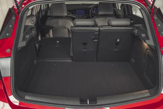 The rear passenger seat is roomier and folds down to give ample luggage space
