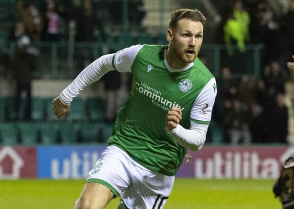 Martin Boyle wheels away to celebrate his equaliser against Livingston. Picture: Bruce White/SNS