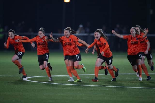 Glasgow City players rush forward in jubilation as Jo Love scores the winning penalty in last nights dramatic shootout against Brondby. Picture: Getty.