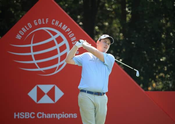 Bob MacIntyre tees off at the fourth at Sheshan International on his way to a three-under 69 in the second round of the WGC-HSBC Champions. Picture: Andrew Reddington/Getty Images