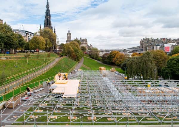Scaffolding is erected in Princes Street Gardens East in preparation for the Christmas market. Picture: Ian Georgeson