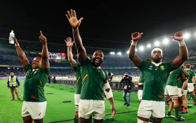 South Africa's hooker Bongi Mbonambi (L), prop Tendai Mtawarira (C) and flanker Siya Kolisi celebrate reaching the final. Picture: Odd Andersen/AFP via Getty Images