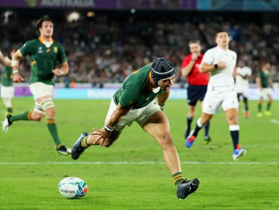 Cheslin Kolbe of South Africa celebrates after scoring his team's second try
