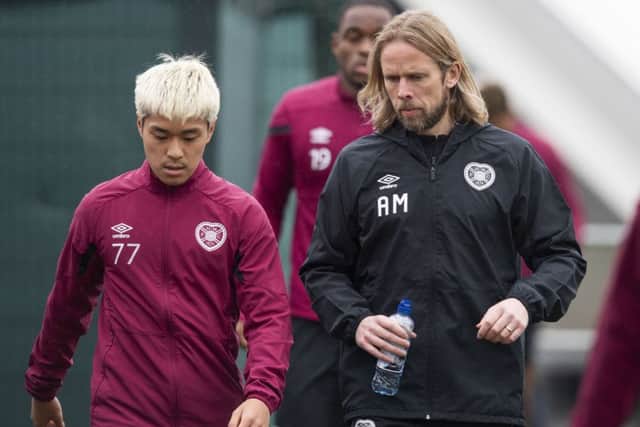 Hearts' interim manager Austin McPhee makes a point to loan attacker Ryotaro Meshino.Picture: Ross Parker/SNS