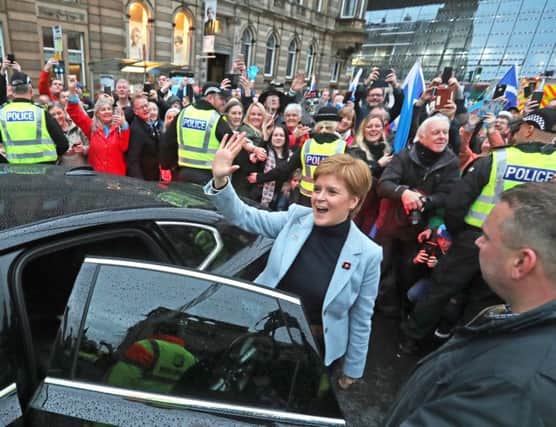Nicola Sturgeon arrives at George Square for a mass pro-independence rally. Picture: PA