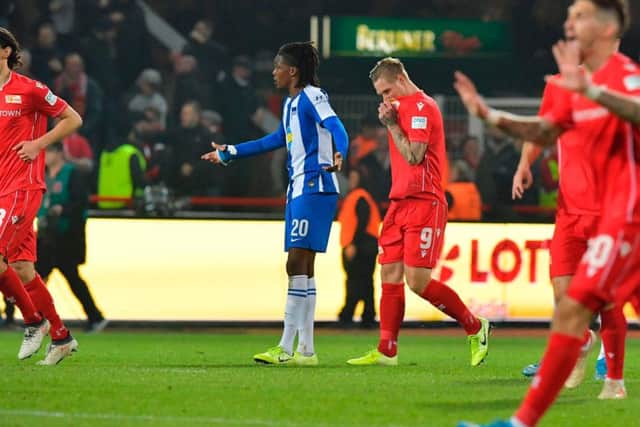 Dedryck Boyata cuts a dejected figure as Union's players celebrate
