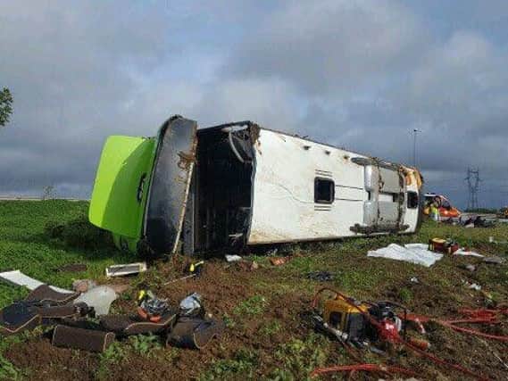 TheFlixbus vehicle toppled as it took the exit off the A1 motorwaybetween Amiens and Saint-Quentin. Picture: Gendarmerie de la Somme
