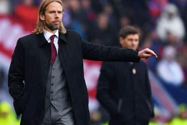 Austin MacPhee instructs Hearts from the technical area at Hampden