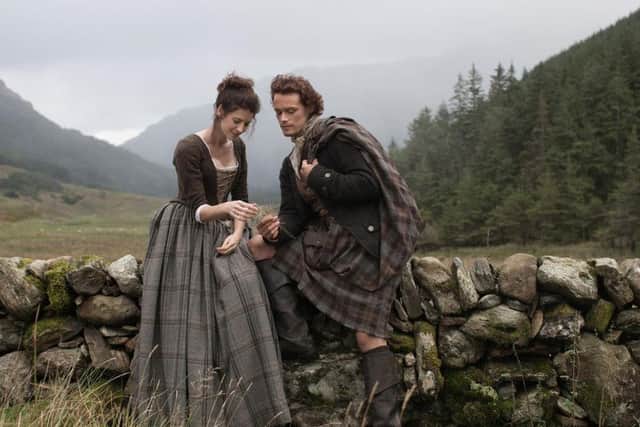 Caitriona Balfe and Sam Heughan playing Claire Randall and Jamie Fraser in the TV series Outlander. Picture: Nick Briggs