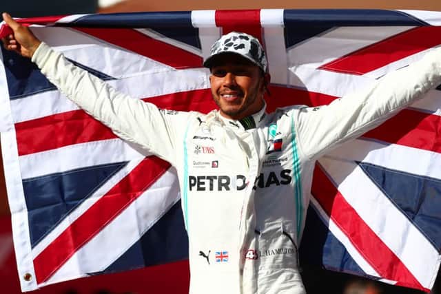 Lewis Hamilton celebrates after clinching his sixth world championship with a second-place finish at the Circuit of The Americas. Picture: Dan Istitene/Getty Images
