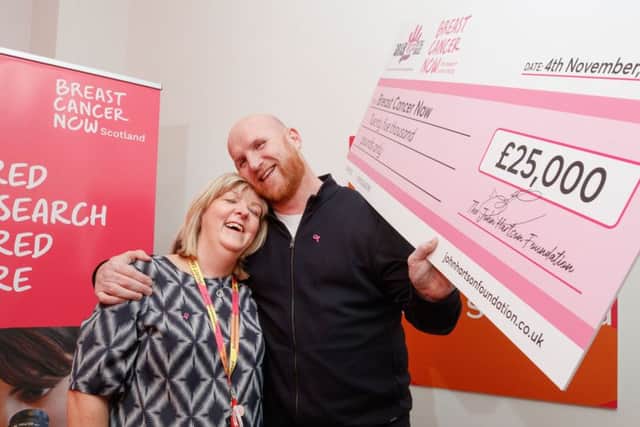 Former Celtic striker John Hartson presented a cheque for £25,000 to Breast Cancer Now on behalf of his foundation, which raises money for worthy causes.