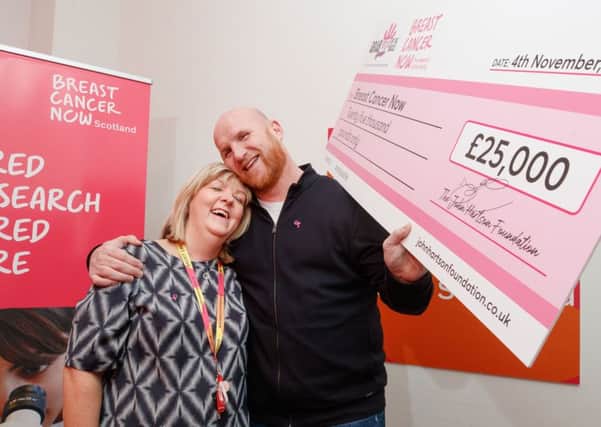 Former Celtic striker John Hartson presented a cheque for £25,000 to Breast Cancer Now on behalf of his foundation, which raises money for worthy causes.