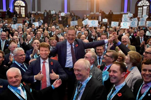 Brexit Party leader Nigel Farage (centre R) and Brexit Party Chairman Richard Tice (centre L). Picture: Getty Images