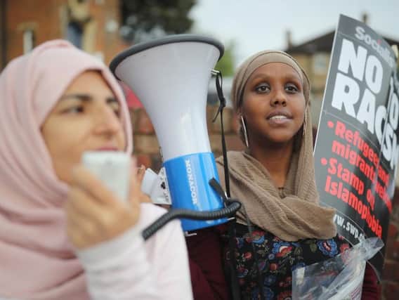 Muslim women protest after Boris Johnson's "letterbox" comments about the wearing of the burqua.